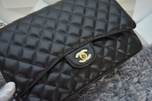 Ch**el caviar leather flap bag with gold/silver chain black 33cm
