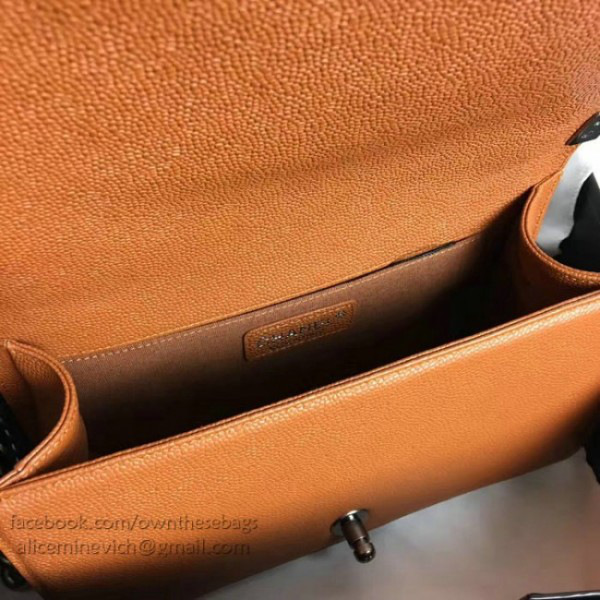 Ch**el caviar grained calfskin boy bag with top handle orange