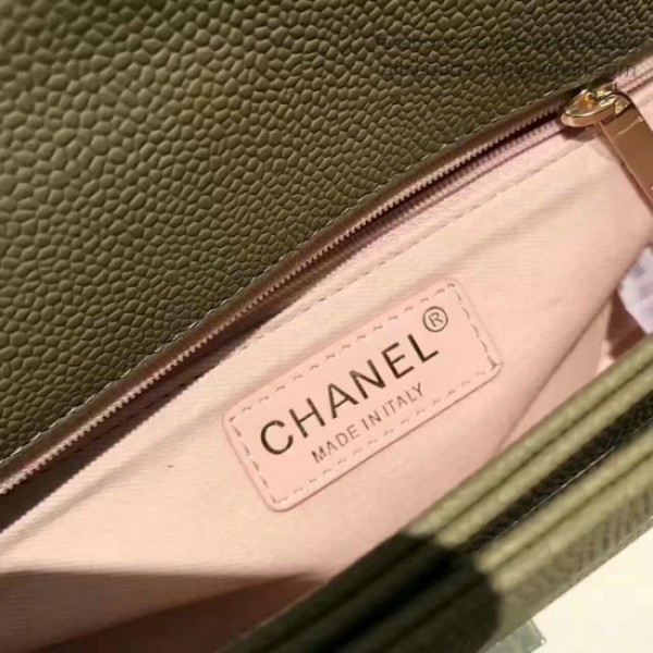 Ch**el grained calfskin flap bag with top handle green