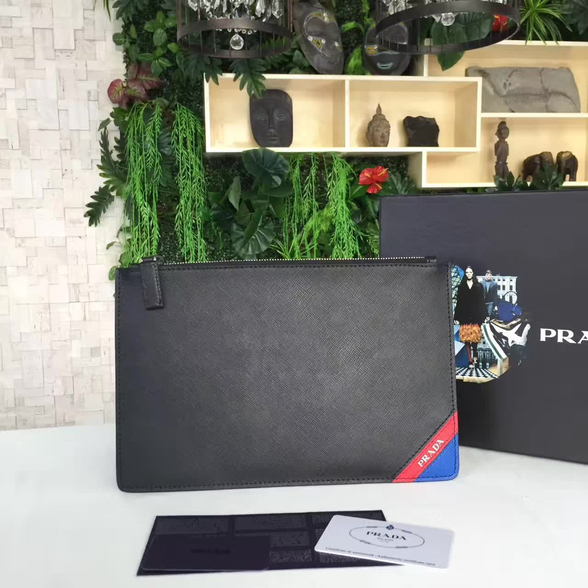 Pra*a leather clutch bag 4186