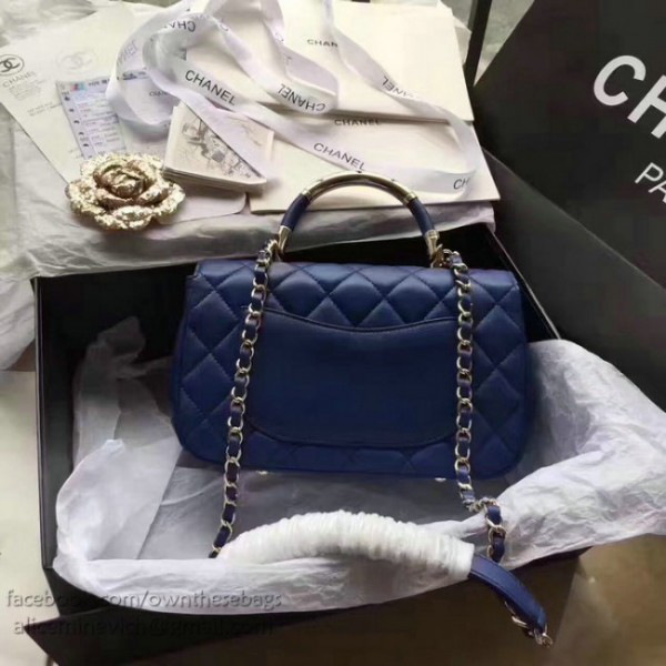 Ch**el caviar quilted lambskin flap bag with top handle blue