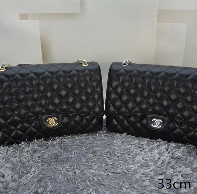 Ch**el caviar leather flap bag with gold/silver chain black 33cm