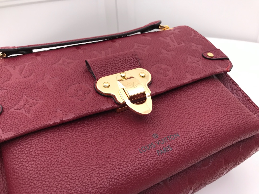 l0vis Vvtt0n vavin pm monogram empreinte leather scarlet m44151 26 x 20 x 8 cm