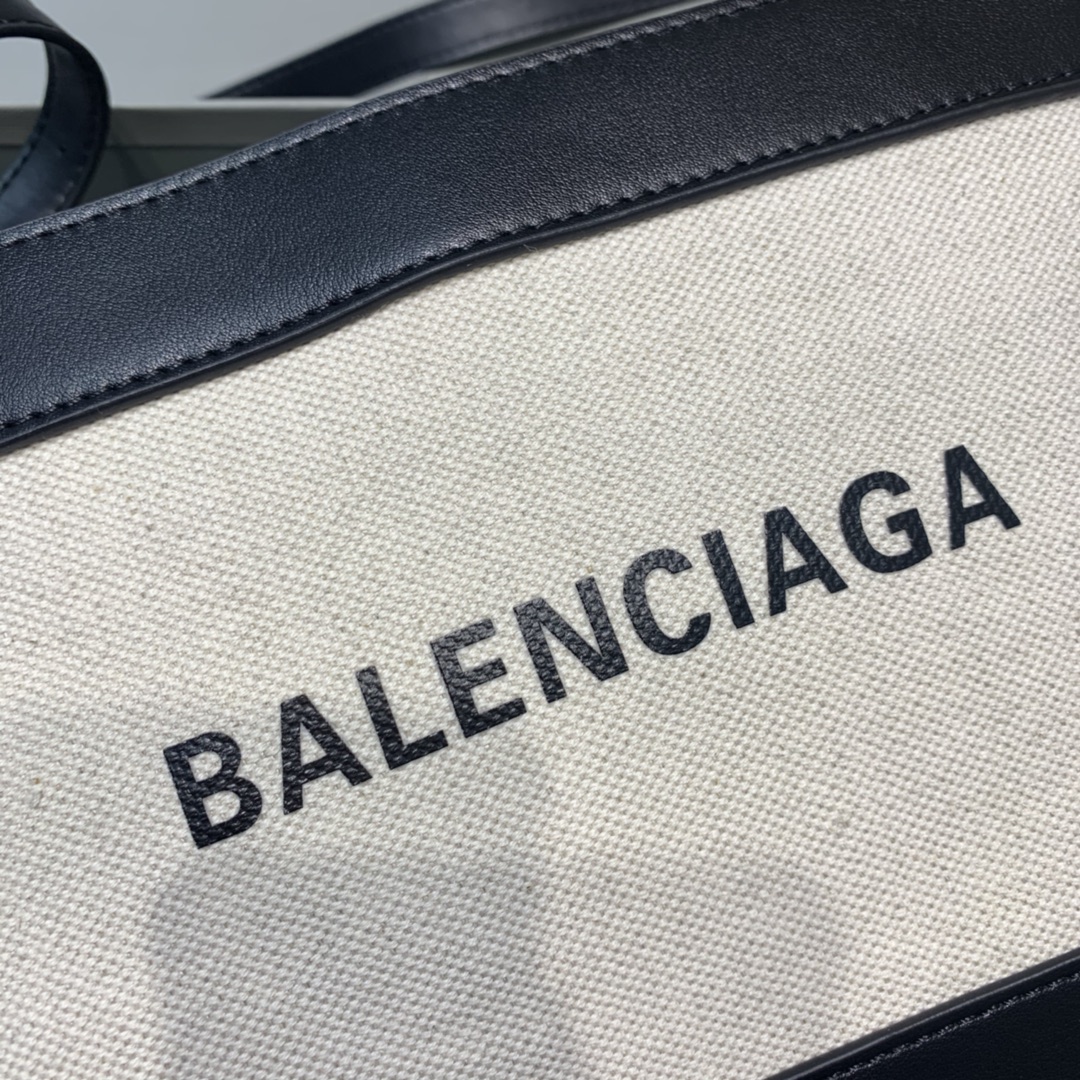 Ba1en*iaga leather trimmed canvas shoulder bag in white 26 x 7 x 19 cm