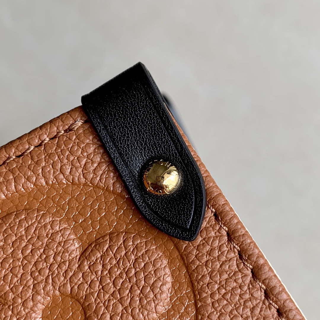 l0vis Vvtt0n onthego mm monogram empreinte embossed leather caramel m58521 35cm