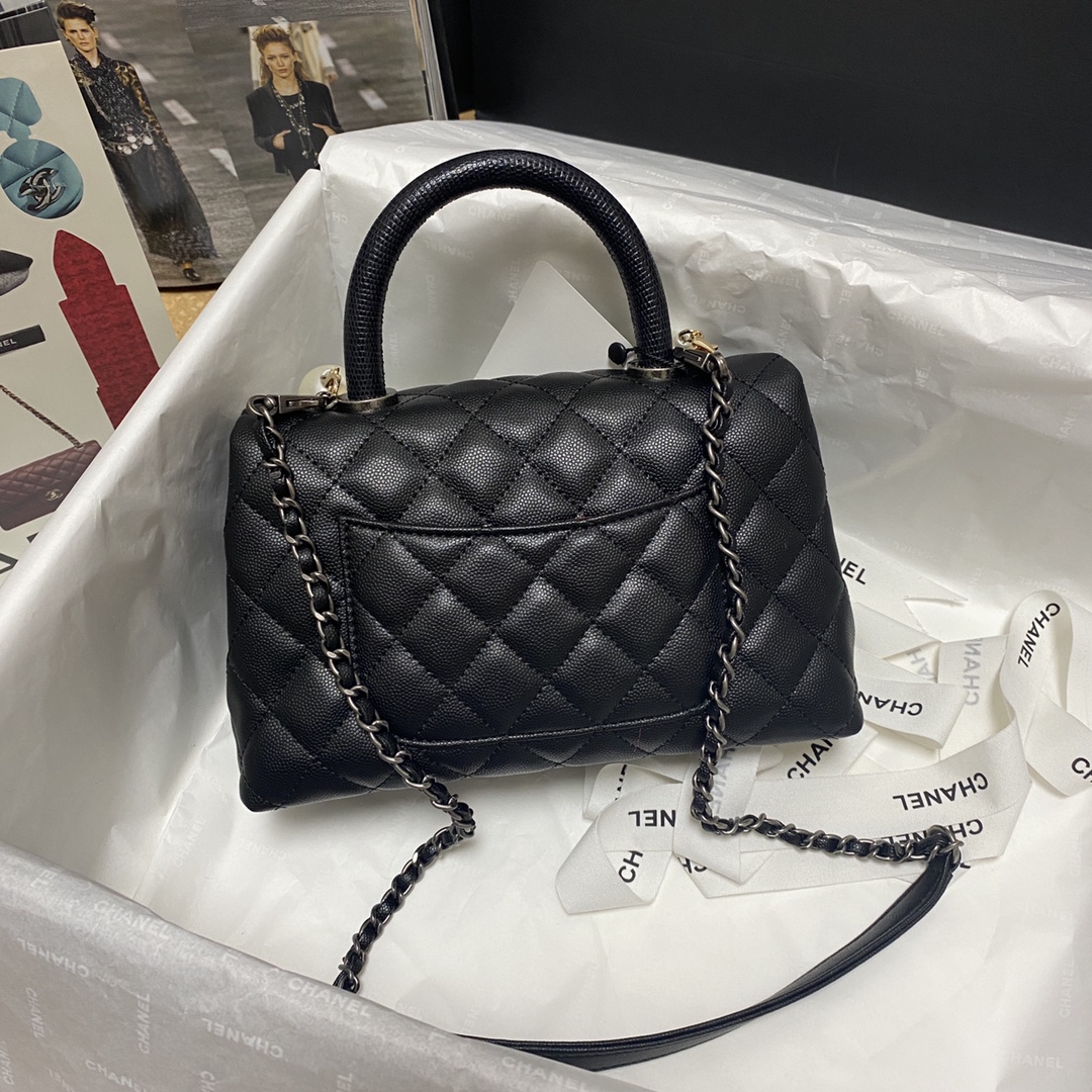 Ch**el flap bag with black top handle grained calfskin silver metal black a92990 23 cm