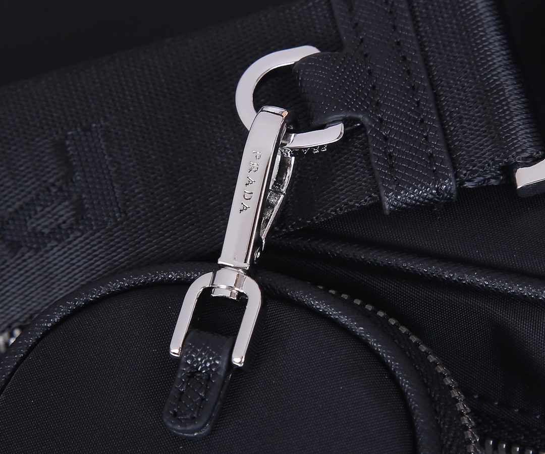 Pra*a nylon and saffiano leather bag with strap black 2vh048 23 x 16 x 7 cm