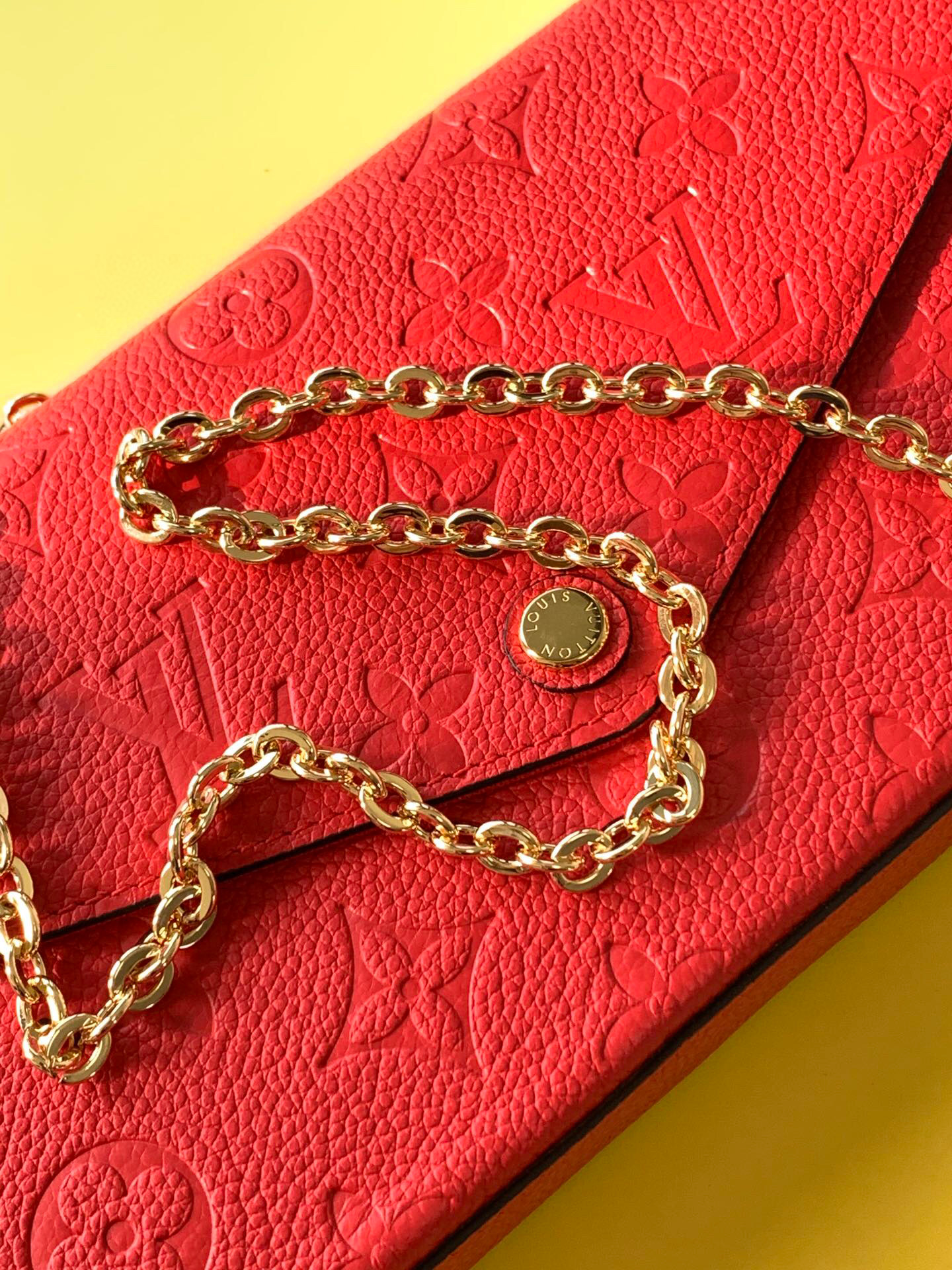 l0vis Vvtt0n fÉlicie pochette monogram empreinte leather red m63700 21 x 12 x 3 cm