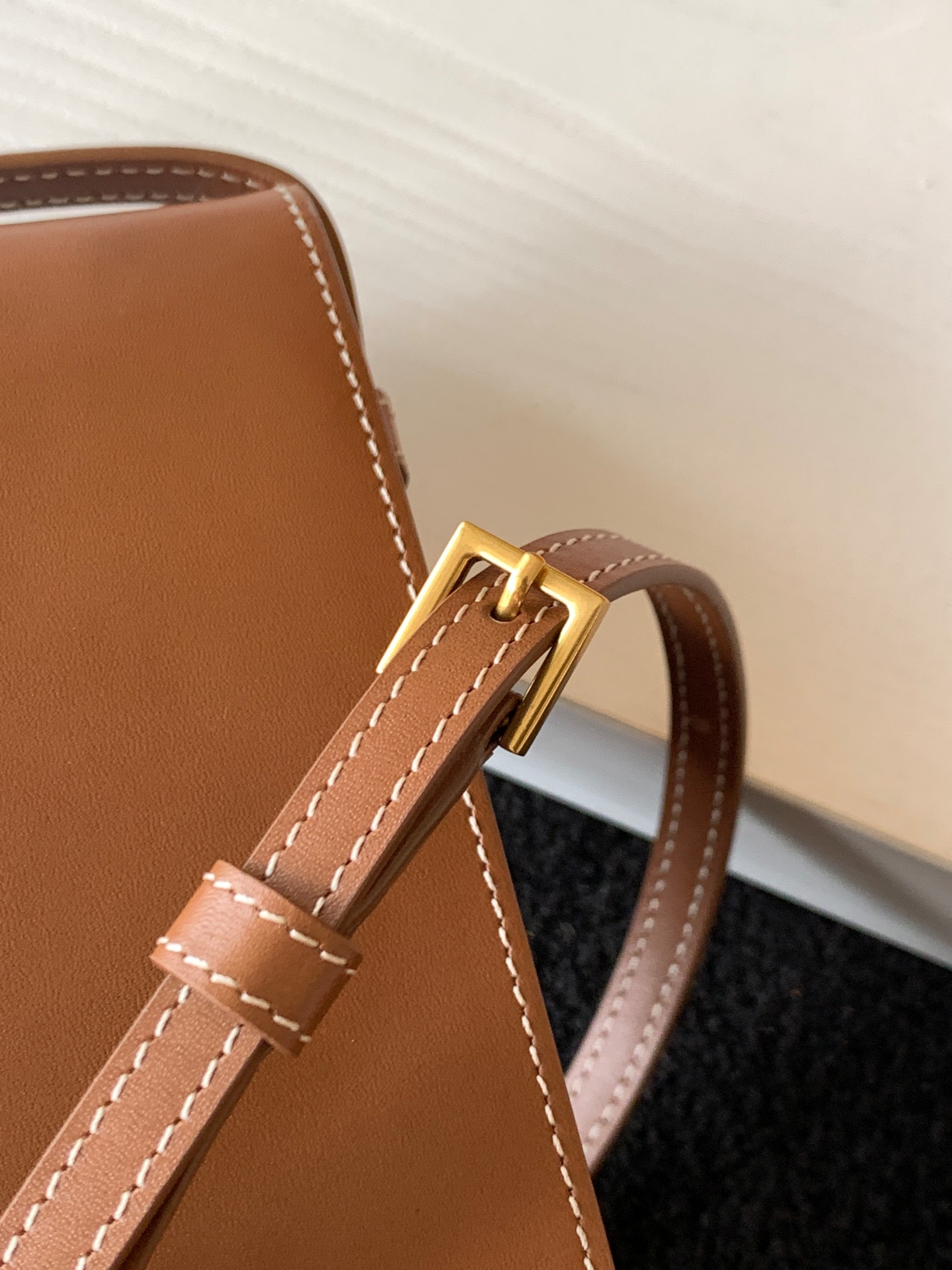 y51 tuc phone pouch with strap in S*pple calfskin brown 6677182 9 x 3.5 x 18 cm