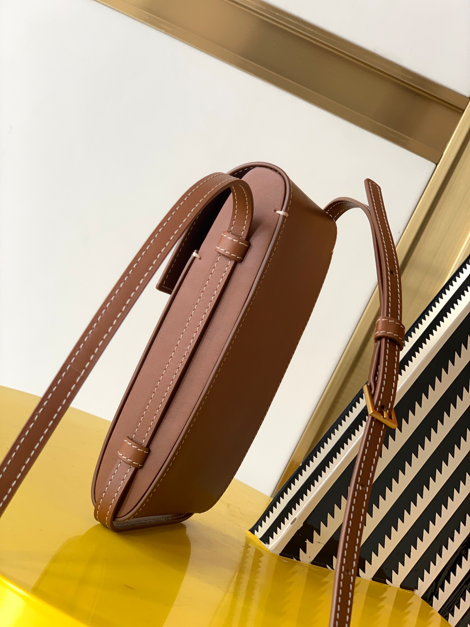 y51 tuc phone pouch with strap in S*pple calfskin brown 6677182 9 x 3.5 x 18 cm