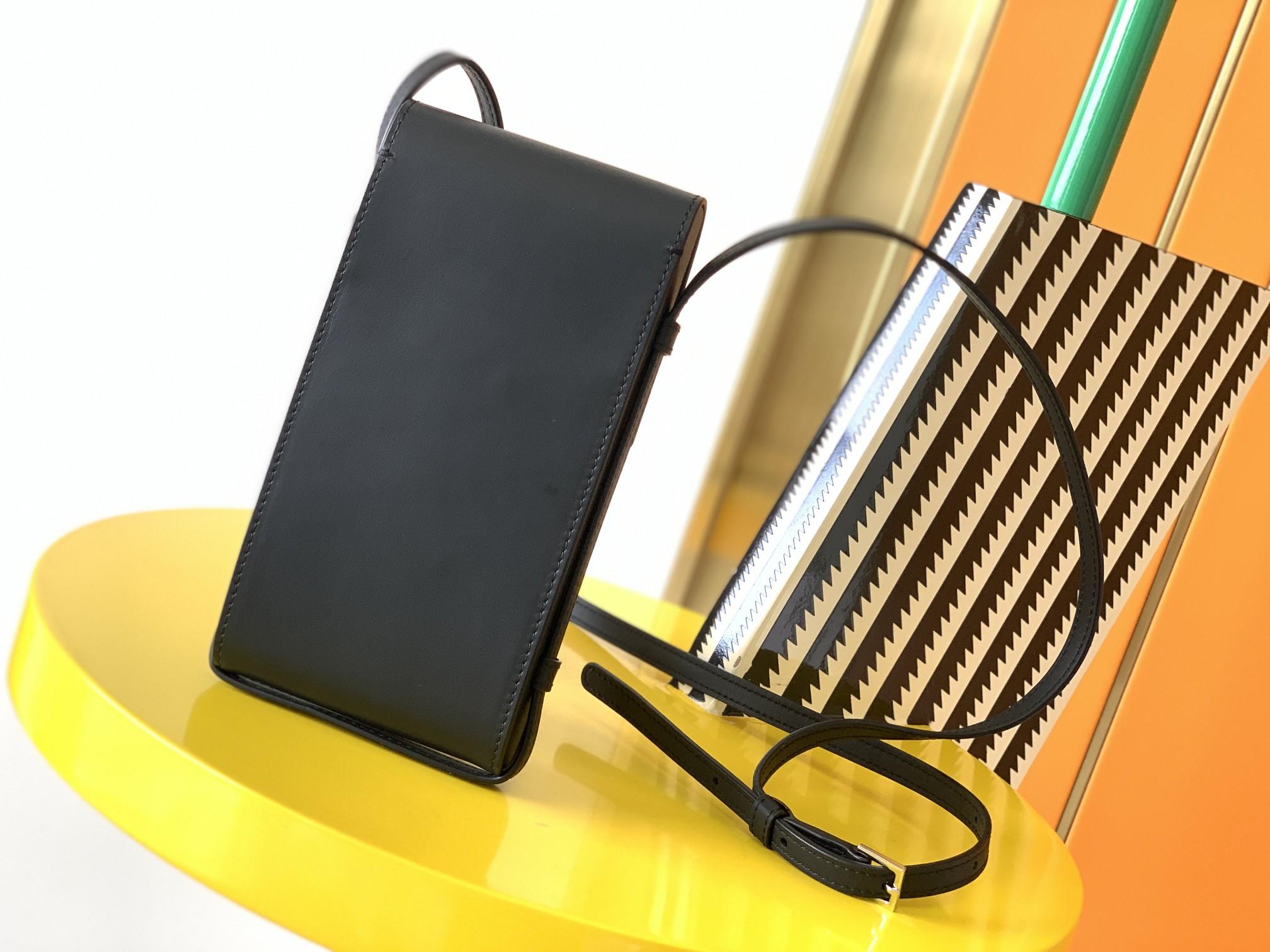 y51 tuc phone pouch with strap in S*pple calfskin black 6677182 9 x 3.5 x 18 cm