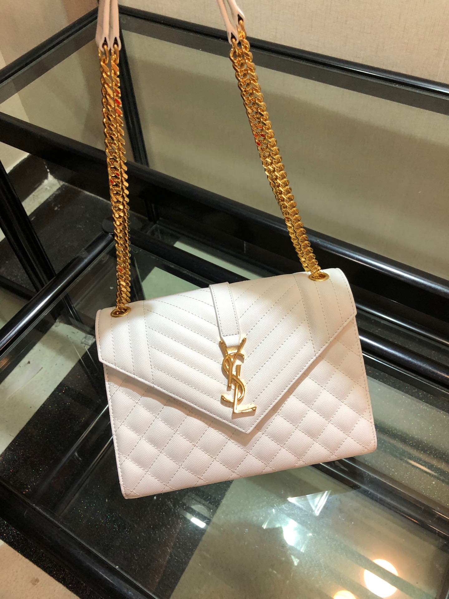 Y51 envelope medium bag in grained leather white 600185 24 x 7.5 x 18 cm